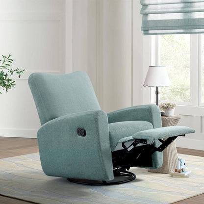 Oxford Baby Synergy Glider - Teal Mist in a room with a window and plant