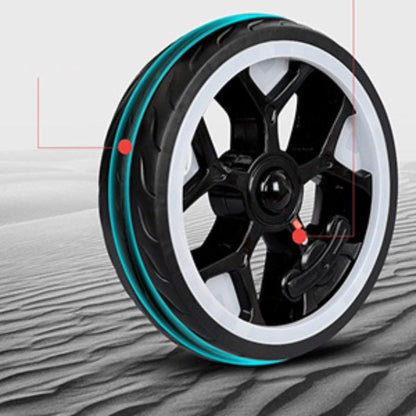 Close-up of a black wheel with a white rim on a textured gray background