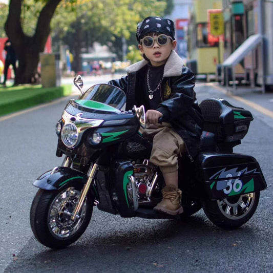 Child on Tamco 12V Kids Electric Ride On Motorcycle - Black in an urban setting