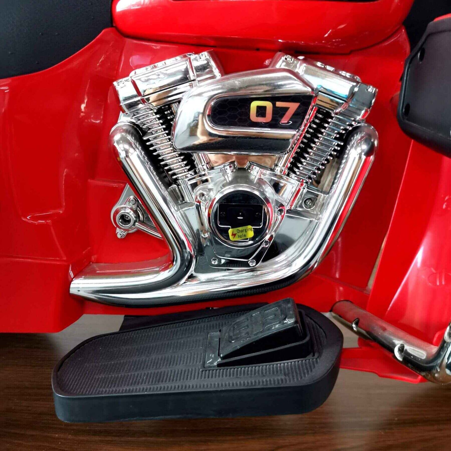 Close-up of Tamco 12V Kids Electric Ride On Motorcycle - Red