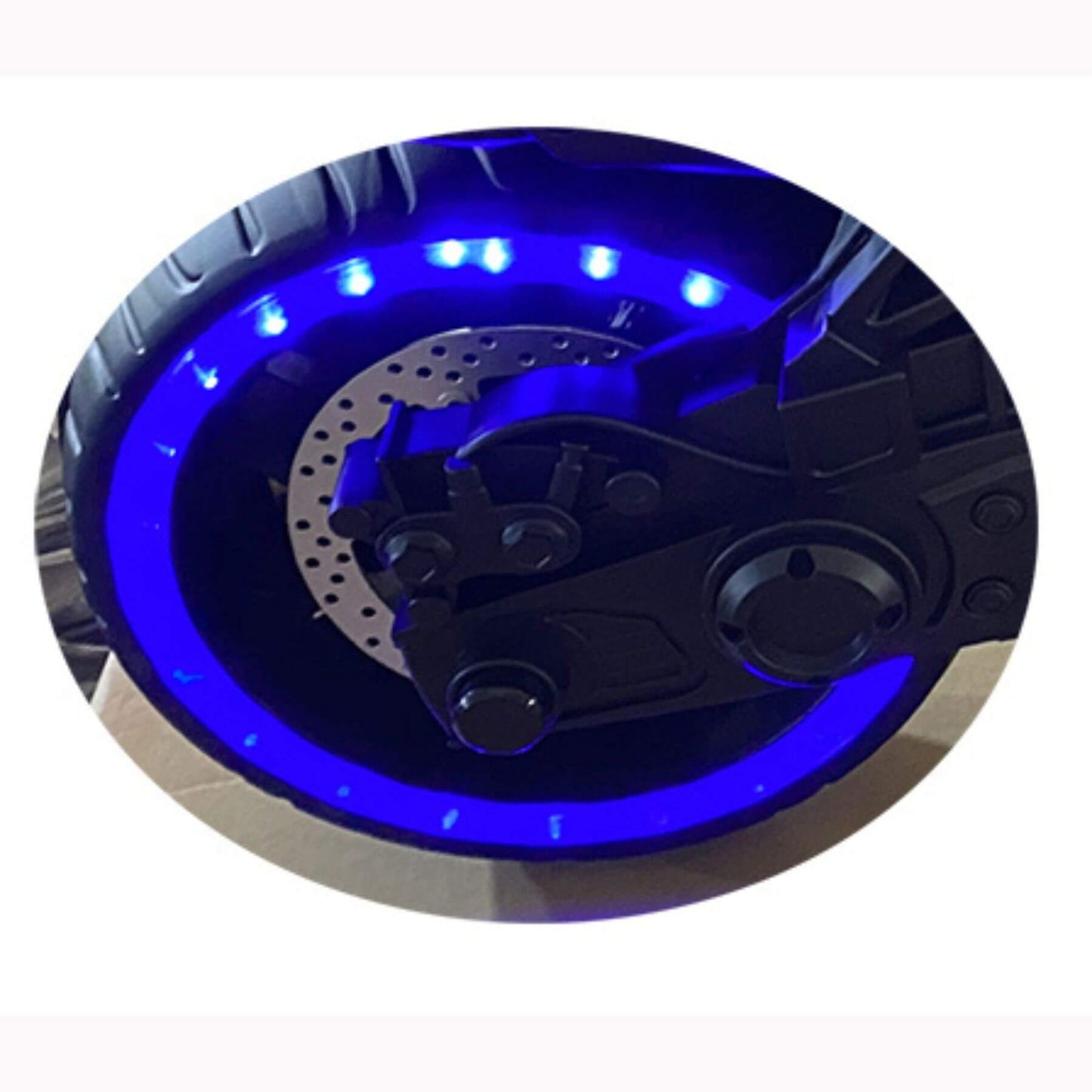 Motorcycle wheel with blue LED lighting on a white background