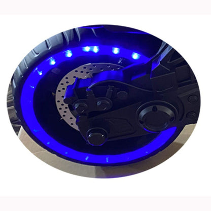 Motorcycle wheel with blue LED lighting on a white background