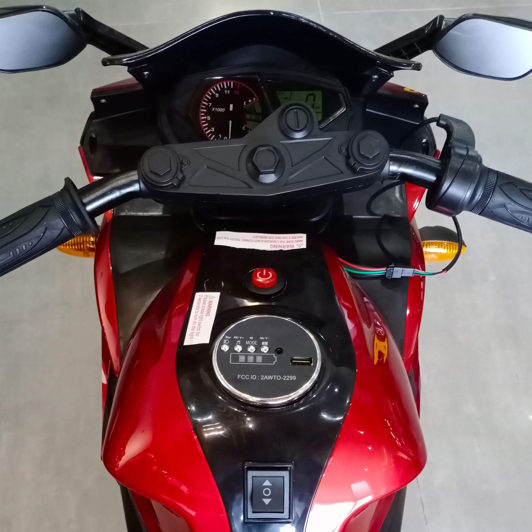 Close-up of Tamco Kids 12V Motorcycle with Training Wheels - Red