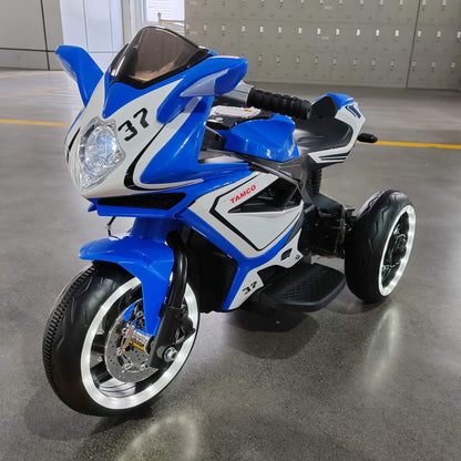Tamco 6V Kids Electric Motorcycle for 3-4 Years Boys - Blue on a gray floor