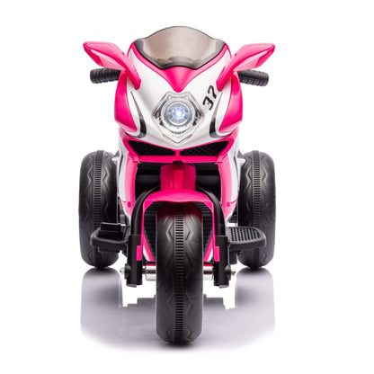 Front view of Child sitting on Tamco 6V Kids Electric Motorcycle - Pink