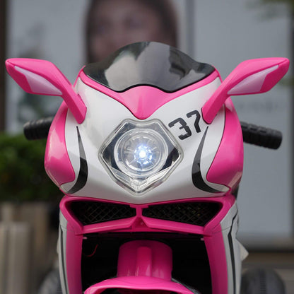 Close-up of Child sitting on Tamco 6V Kids Electric Motorcycle - Pink
