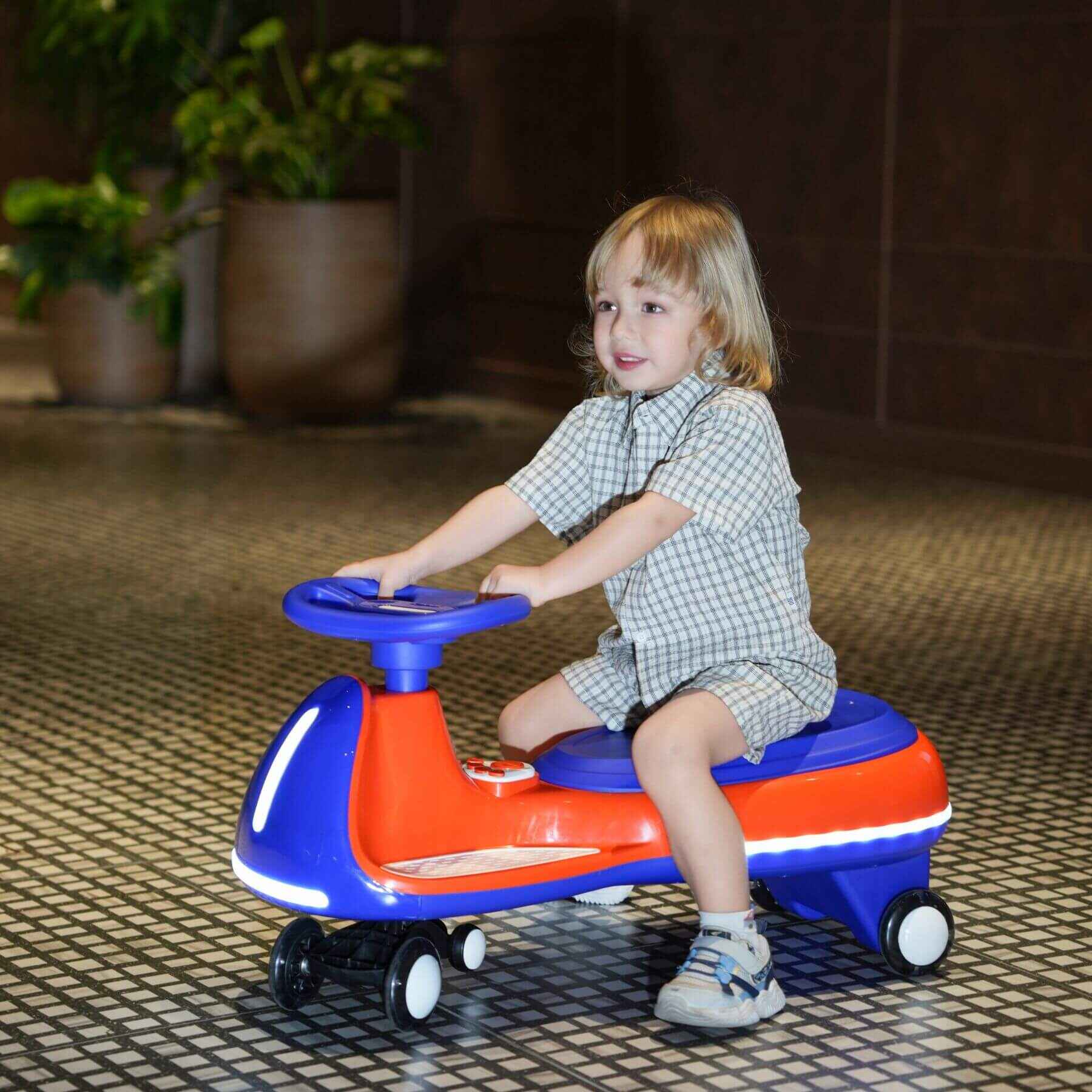 Child playing with Tamco 12V Battery Electric Twist Car indoors