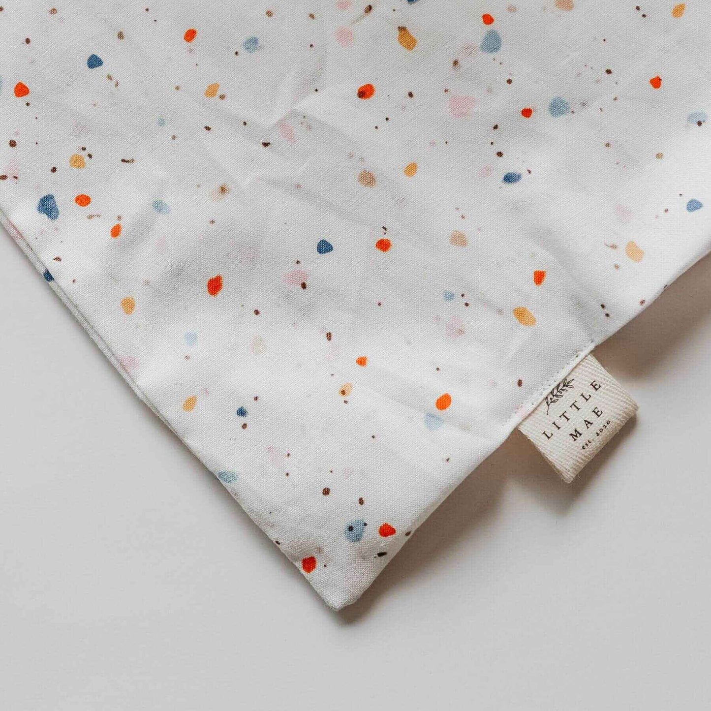 Close-up of Little Mae & Co Tazzo Ring Sling Carrier