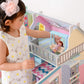 Girl Playing with Teamson Kids Sunroom Dollhouse Multicolor