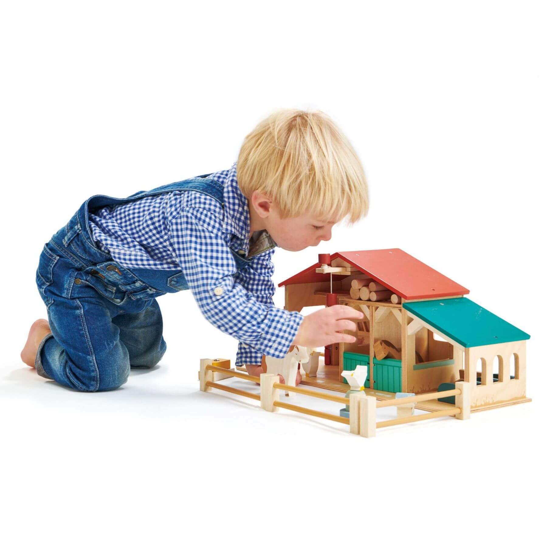 Child playing with Tender Leaf Farm