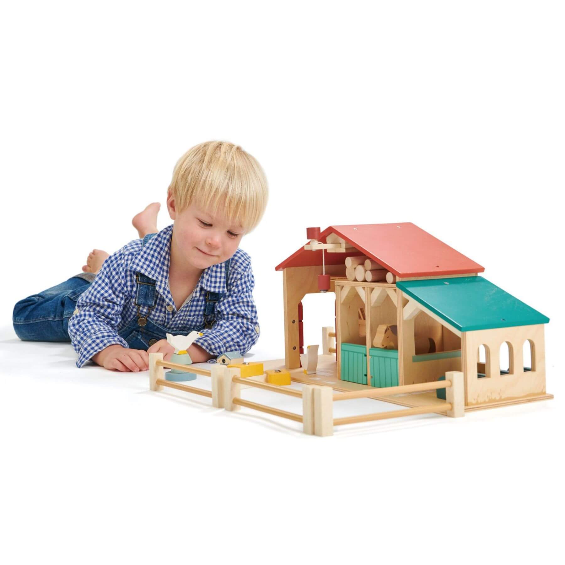 Child playing with Tender Leaf Farm