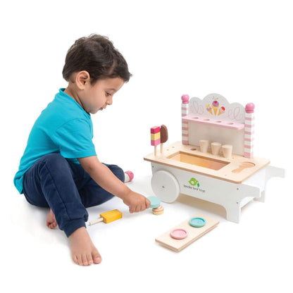 Child playing with Tender Leaf Ice Cream Cart on a white background