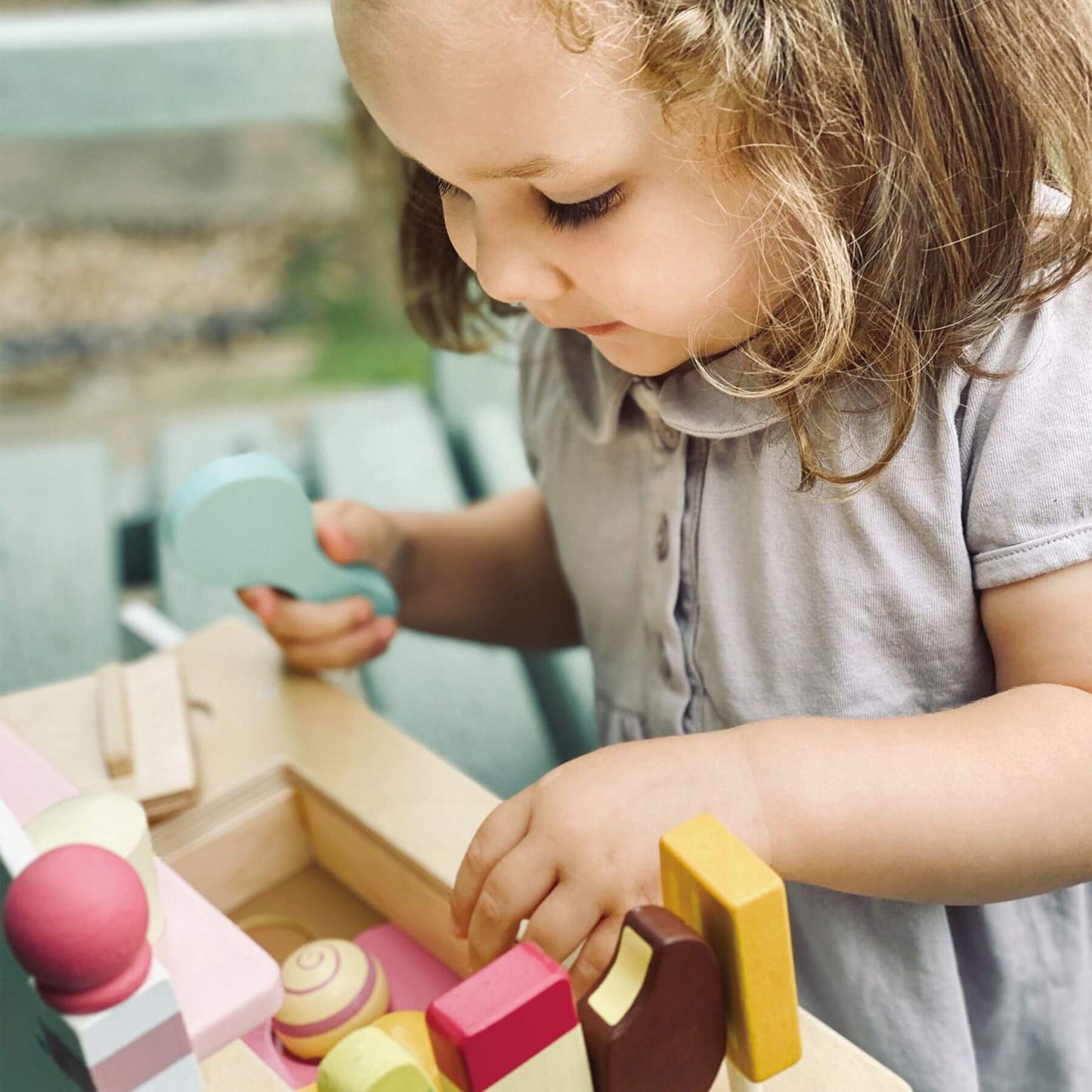 Child playing with Tender Leaf Ice Cream Cart