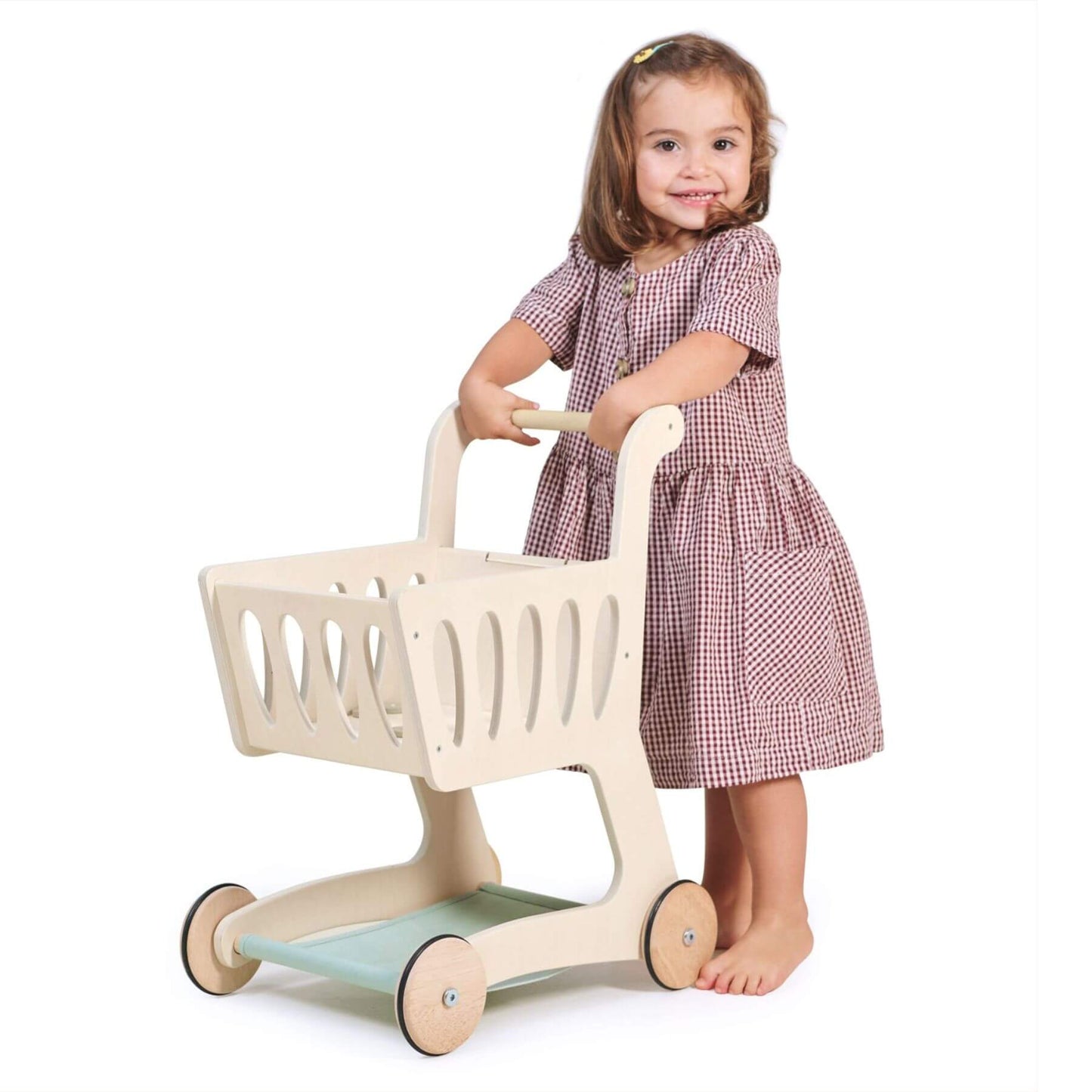 Child playing with Tender Leaf Shopping Cart