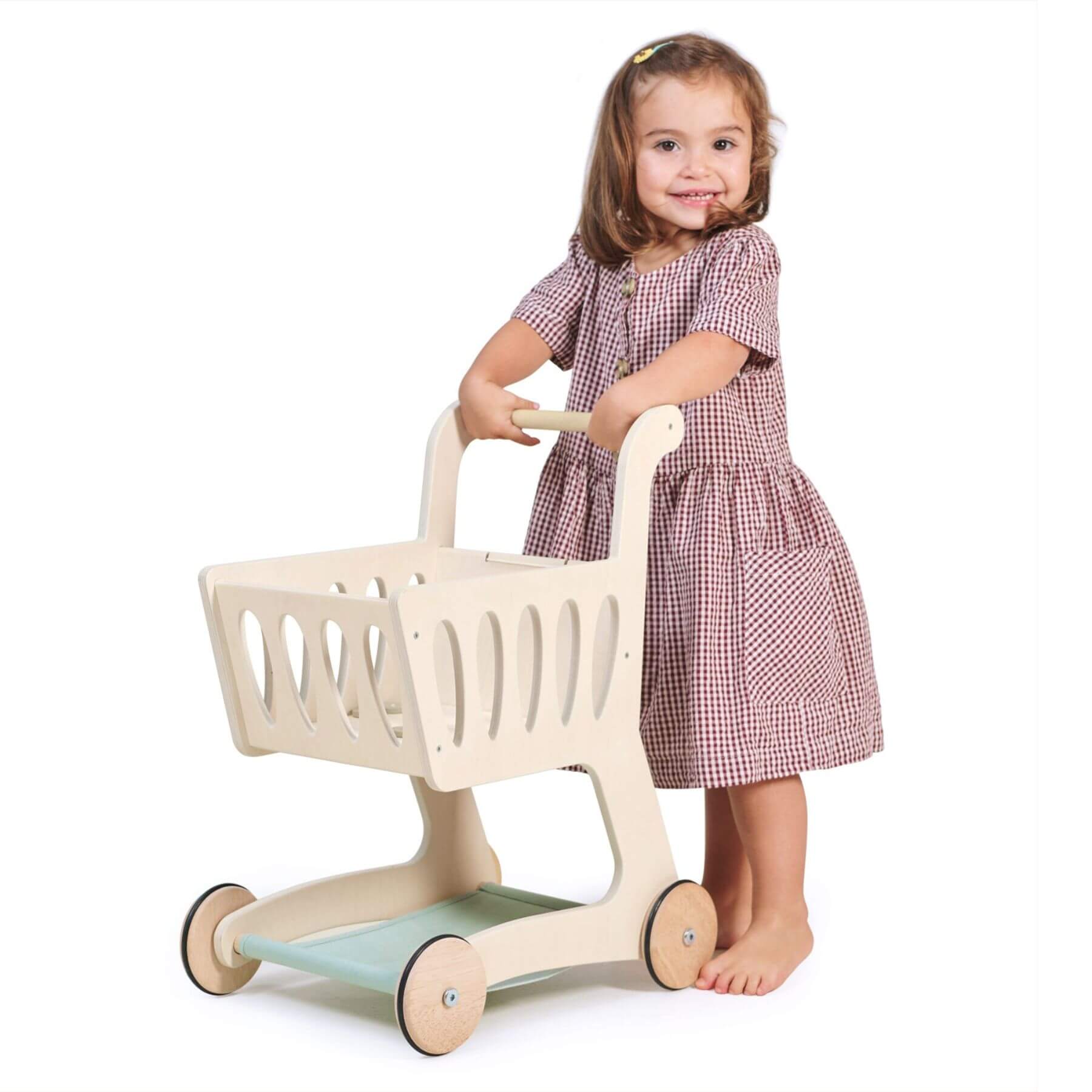 Child playing with Tender Leaf Shopping Cart