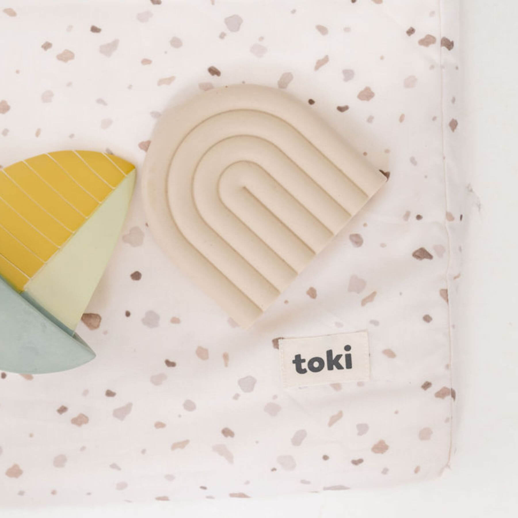 Colorful geometric toys on Terrazzo Chalk Organic Cotton Mat