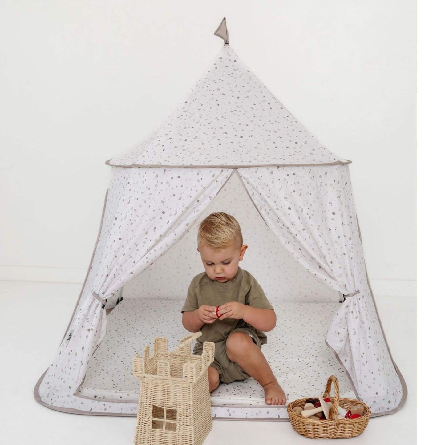 Kid playing inside Toki Kids Terrazzo Chalk Play Tent