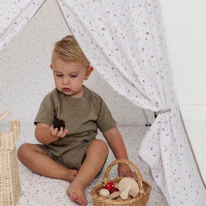Kid playing inside Toki Kids Terrazzo Chalk Play Tent