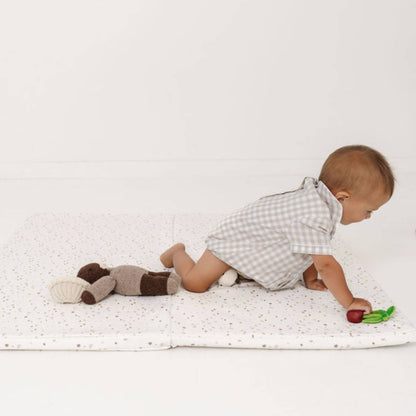 Baby Playing on Toki Kids Terrazzo Chalk Vegan Leather Mat