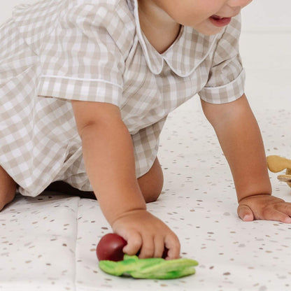 Baby Playing on Toki Kids Terrazzo Chalk Vegan Leather Mat