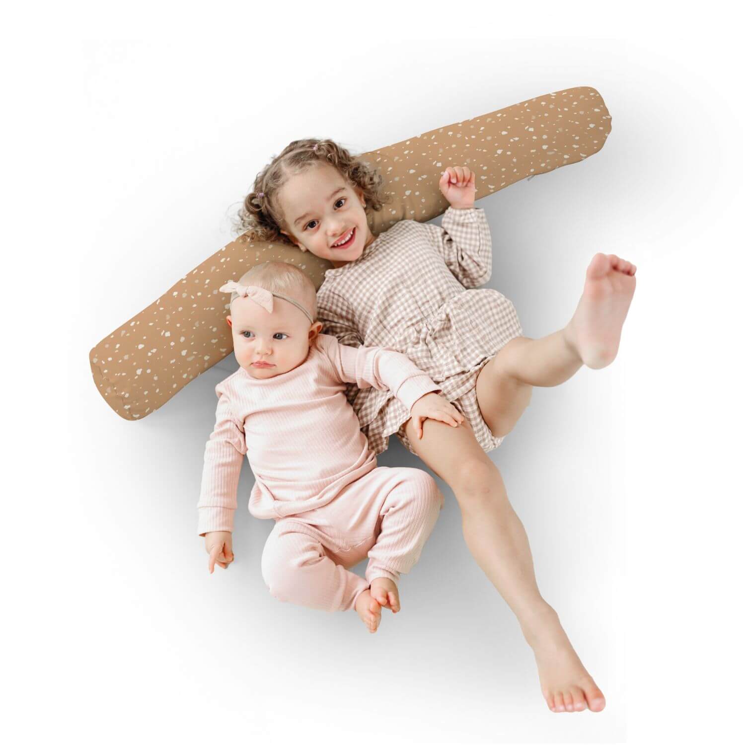 Two children in matching outfits lying on Toki Kids Terrazzo Clay Support Pillow