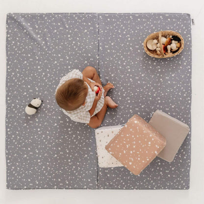 Boy Sitting on Toki Kids Terrazzo Slate Vegan Leather Mat