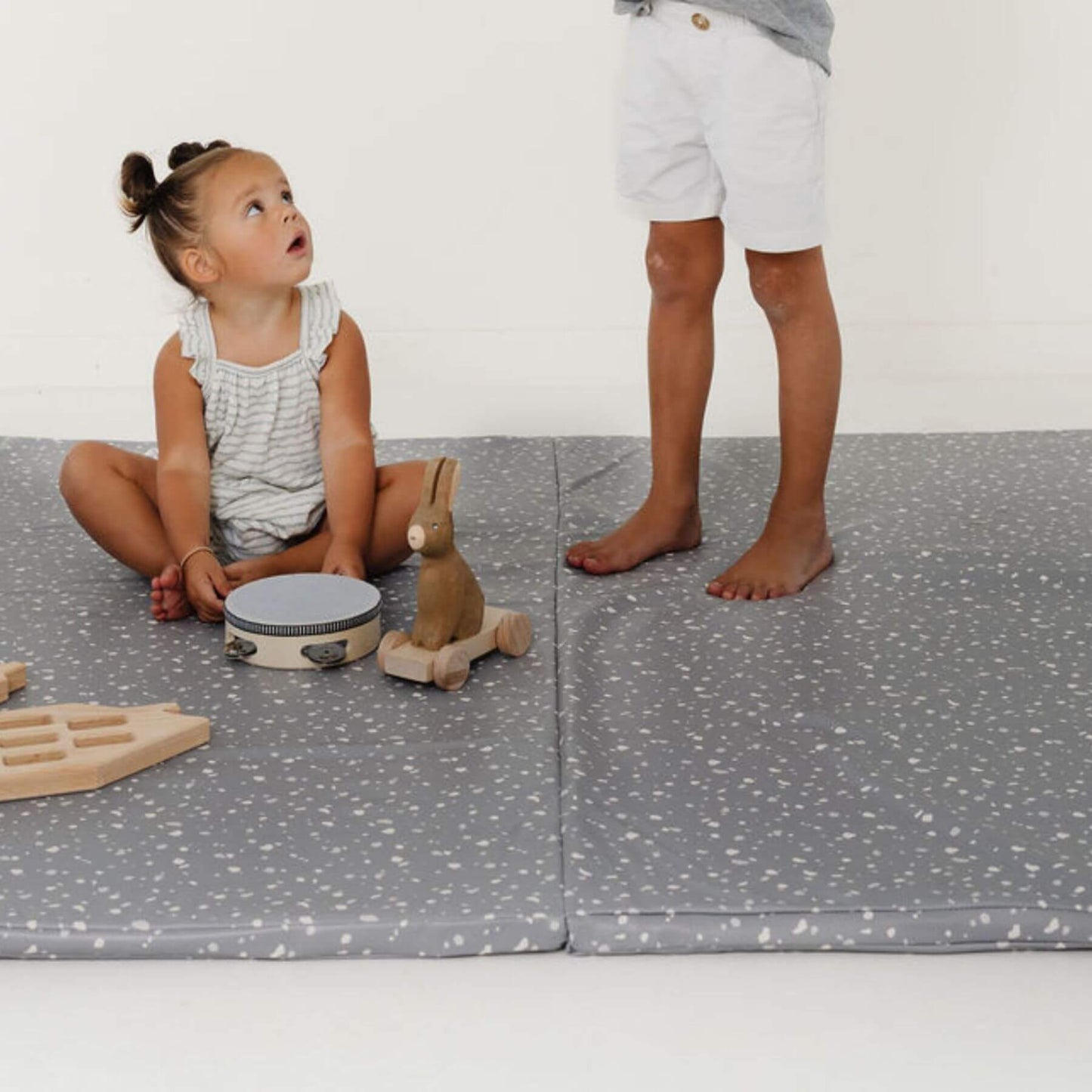 Kids Playing on Toki Kids Terrazzo Slate Vegan Leather Mat