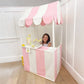 Girl Sitting Behind of Domestic Objects The Market Stand Play Tent Pink