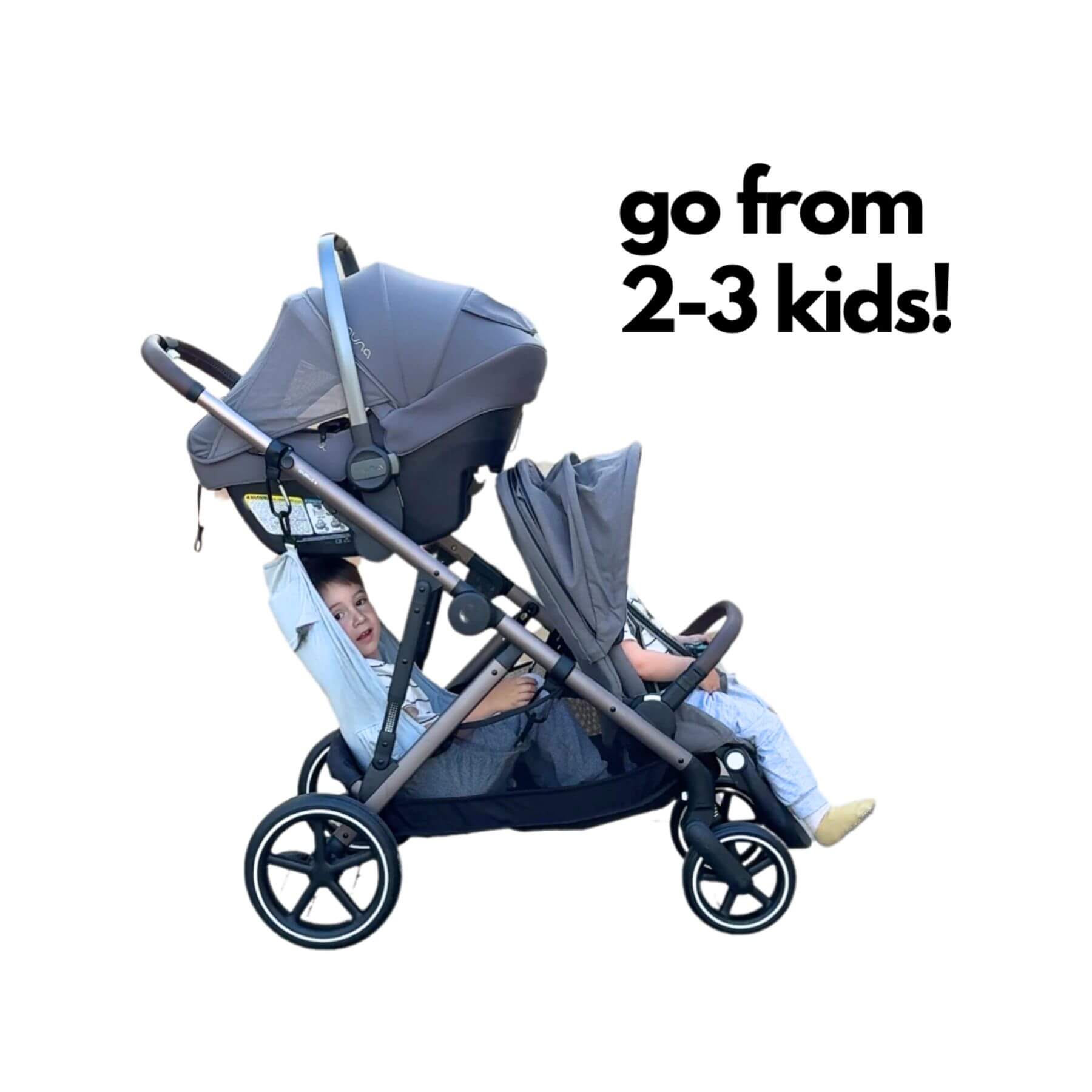 Double stroller with two children inside, text 'go from 2-3 kids!' on a white background