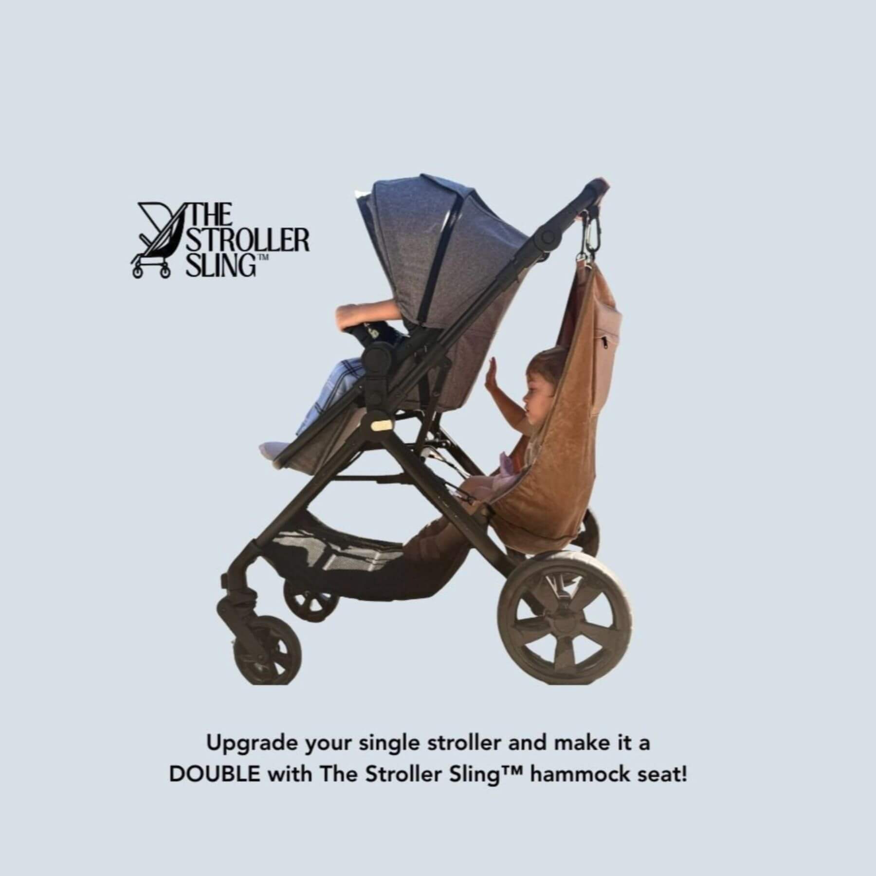 Stroller with The Stroller Sling attachment on a light blue background, featuring 'The Stroller Sling' brand.