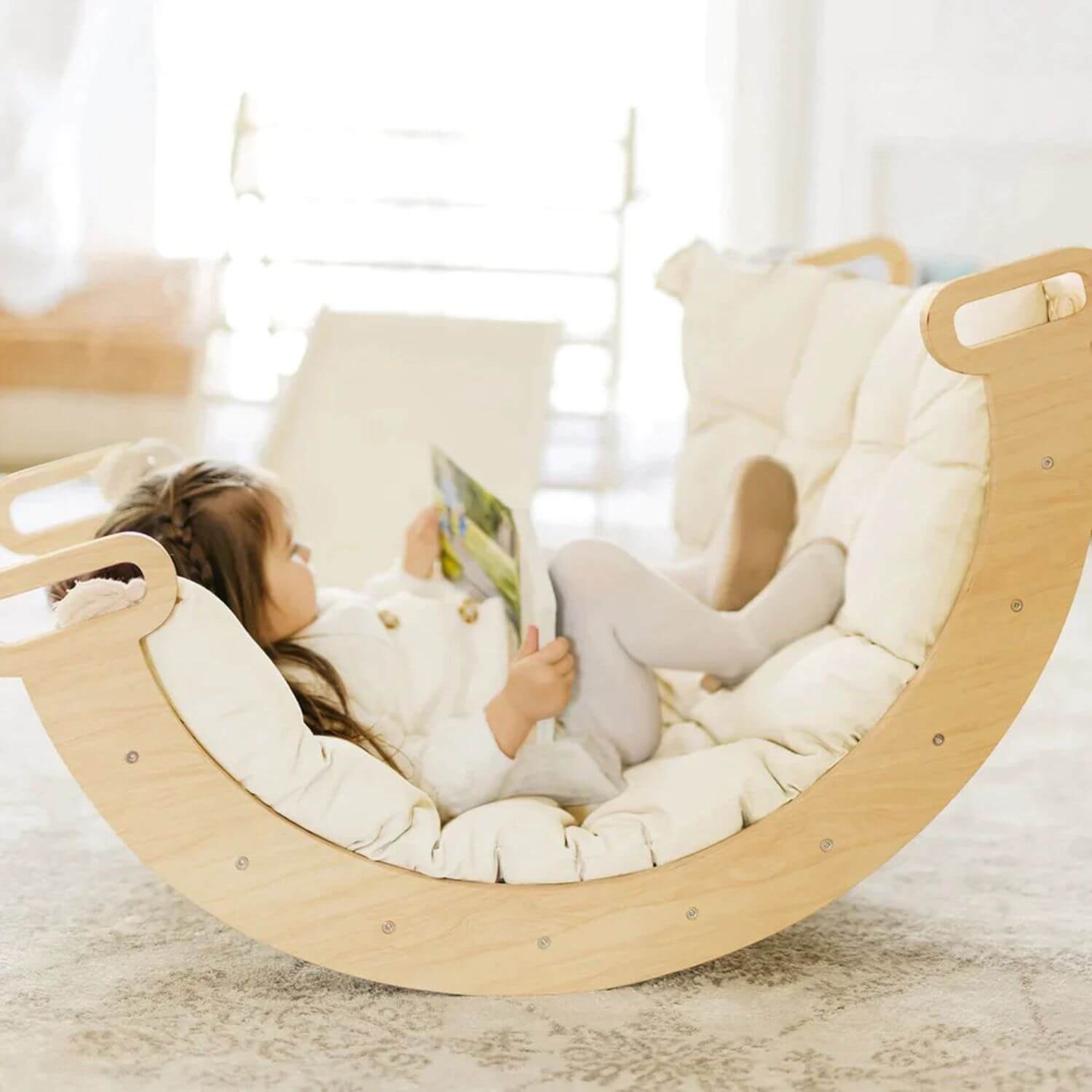 Girl Reading on Tiny Land® Thick Padded Play Cushion in Arch