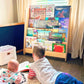 Kids Reading next to RAD Children's Furniture Tiered Montessori Bookshelf