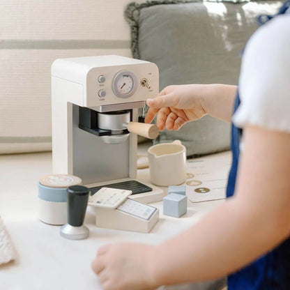 Tiny Land® Children’s Coffee Maker with a child interacting with it on a table.