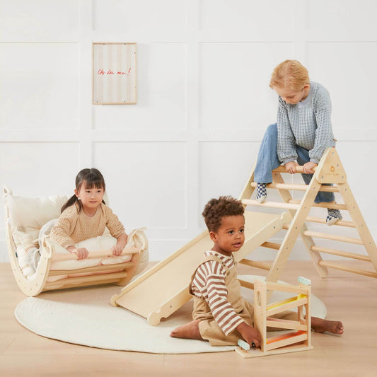 Three Kids Playing Tiny Land® 7-in-1 Montessori Climbing Set with Play Pad