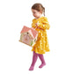 Child in a yellow dress holding Tender Leaf Rosewood Cottage