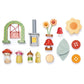 Set of colorful wooden toys including a bridge, lantern, flowers, mushrooms, and people on a white background.