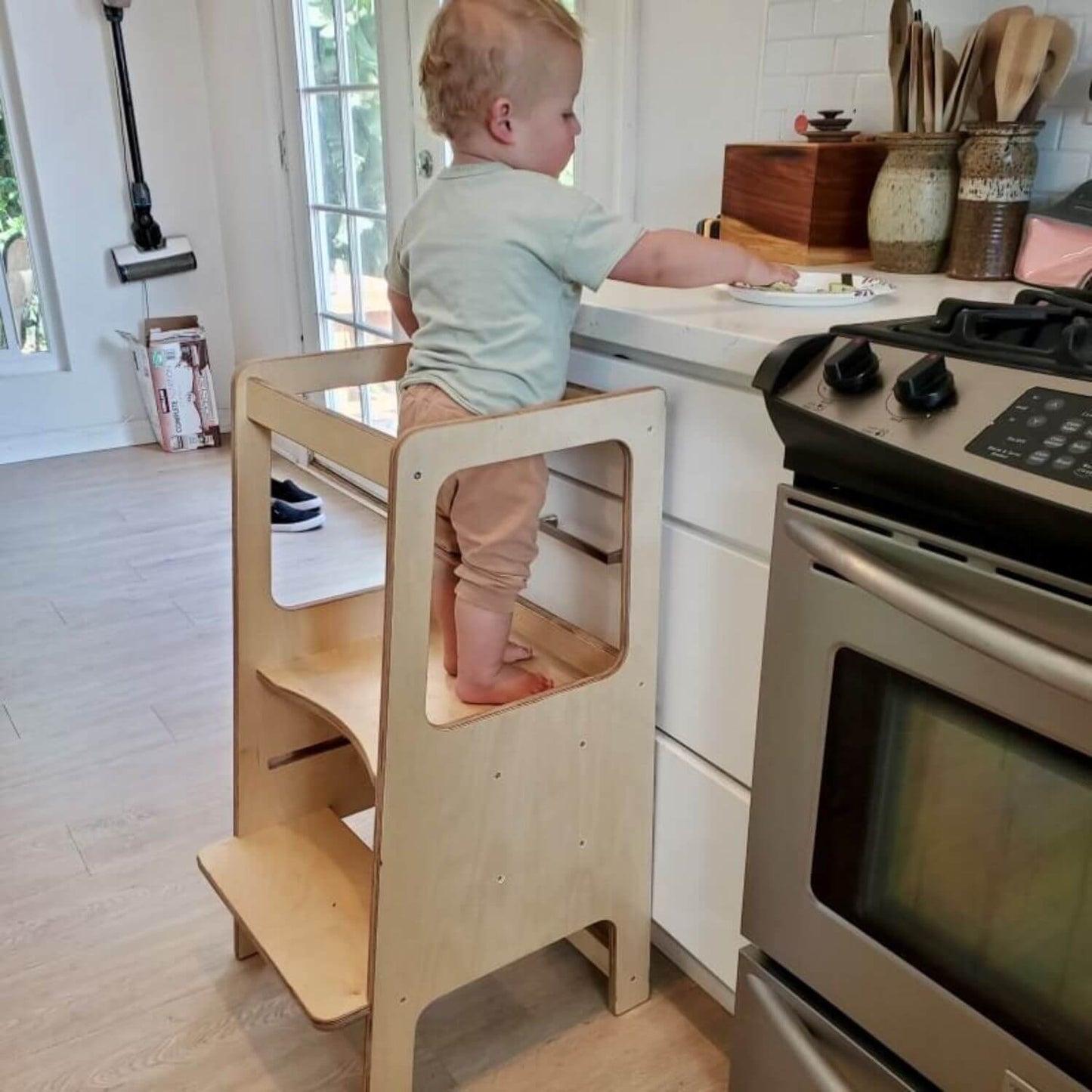 Kid Standing on RAD Children's Furniture Toddler Tower