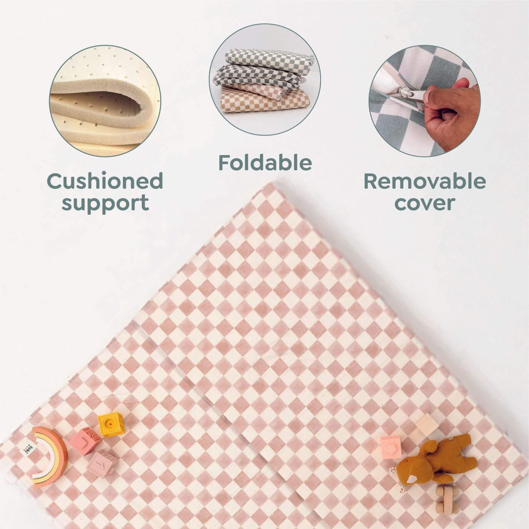 Pink checkered mat with cushioned support, foldable design, and removable cover features on a white background.