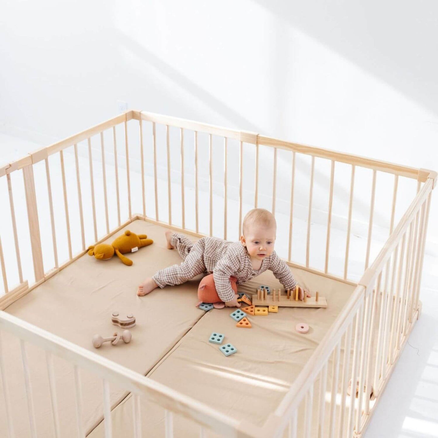 Baby playing toys in Toki Kids Playpen - Mega Size in Wood