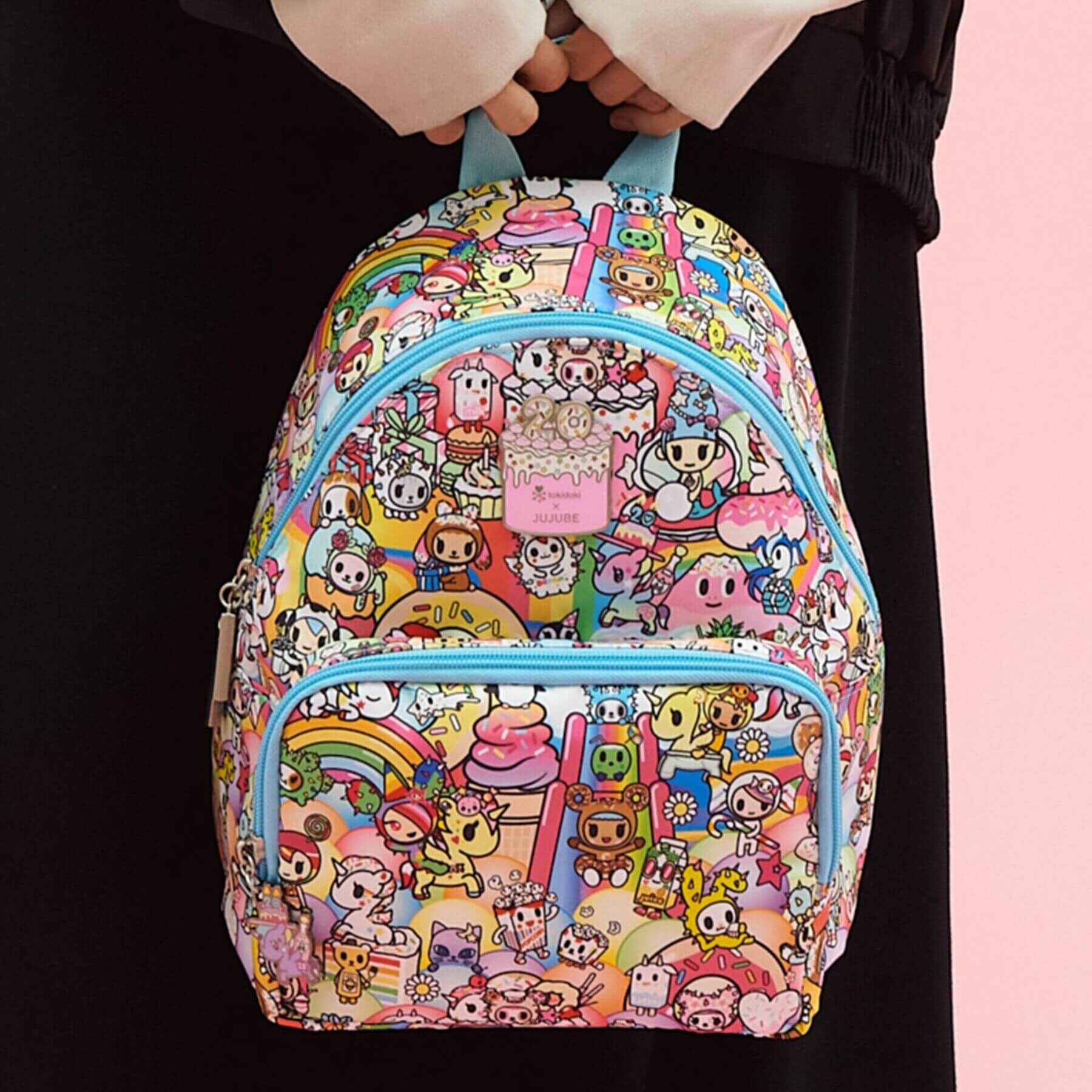 tokidoki Everyday Mini Backpack - 20th Anniversary Celebration held by a person