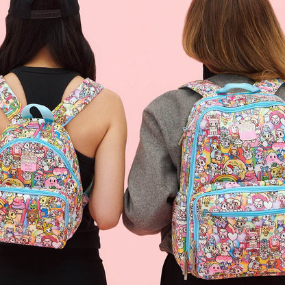 Two people wearing tokidoki Everyday Backpacks against a pink background
