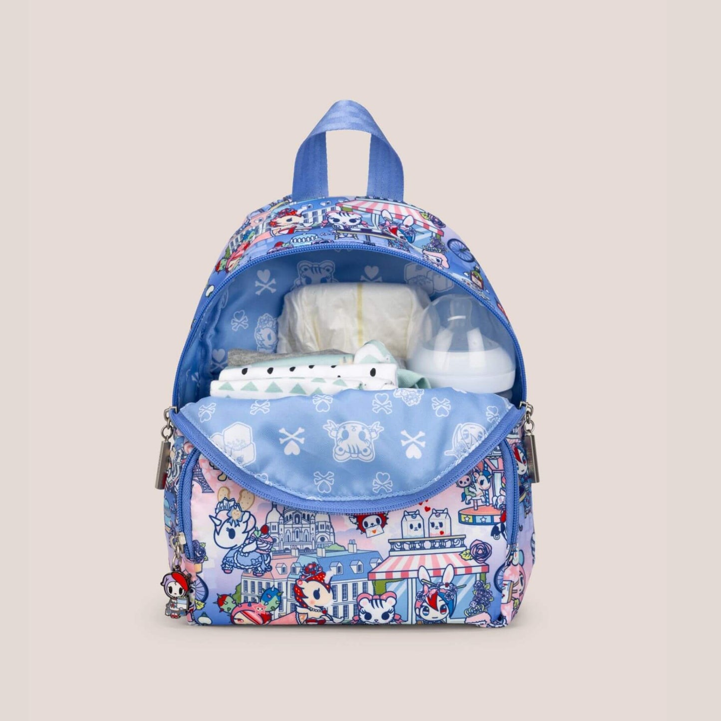 tokidoki Everyday Mini Backpack - C'est la vie à Paris containing baby items on a light gray background
