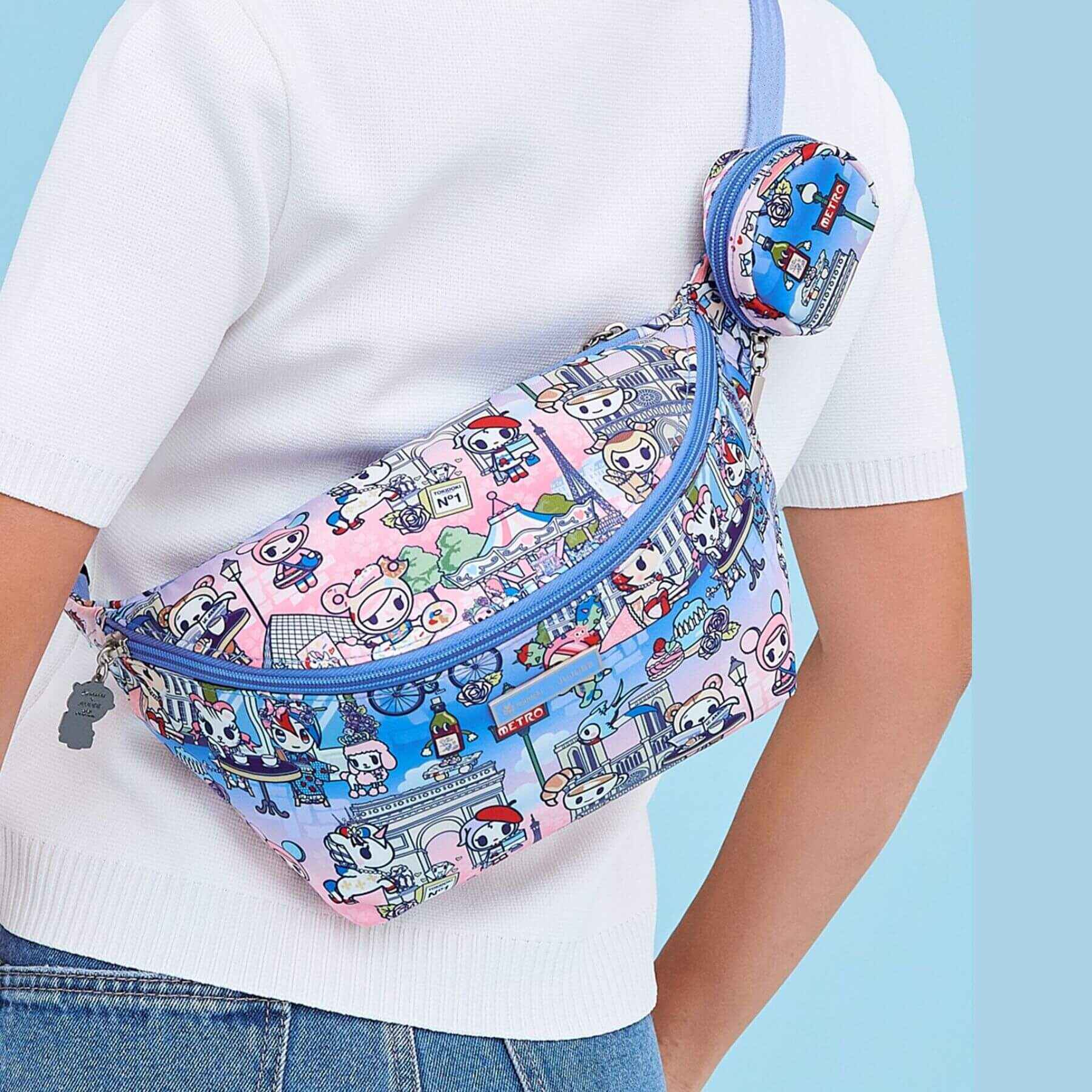 Person wearing tokidoki Park Pack Belt Bag -  C'est la vie à Paris on a light blue background