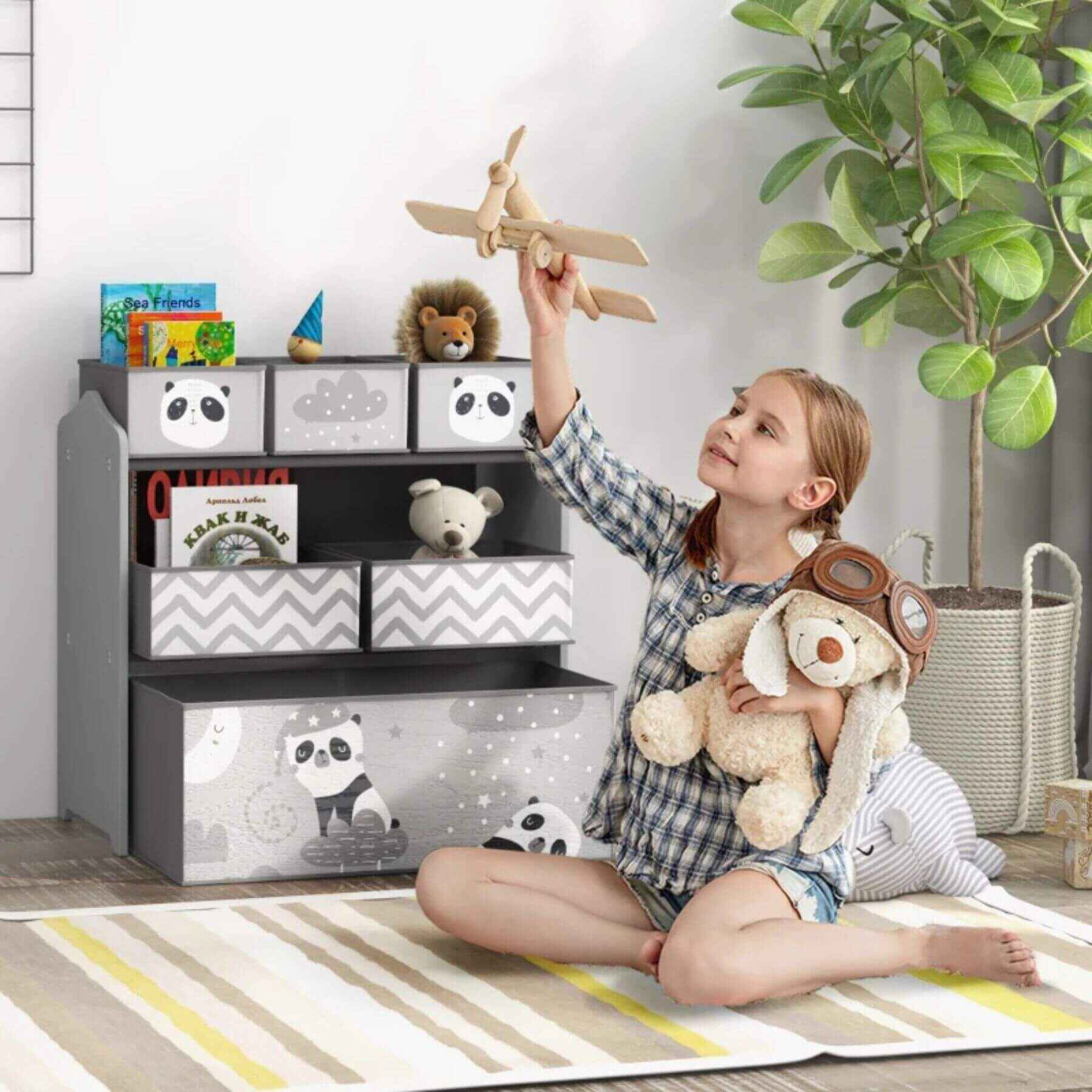 Girl Playing in front of Qaba Toy Organizer with 6 Storage Bins Gray