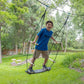 Boy Playing Trelines Treboard Surfin' Swing
