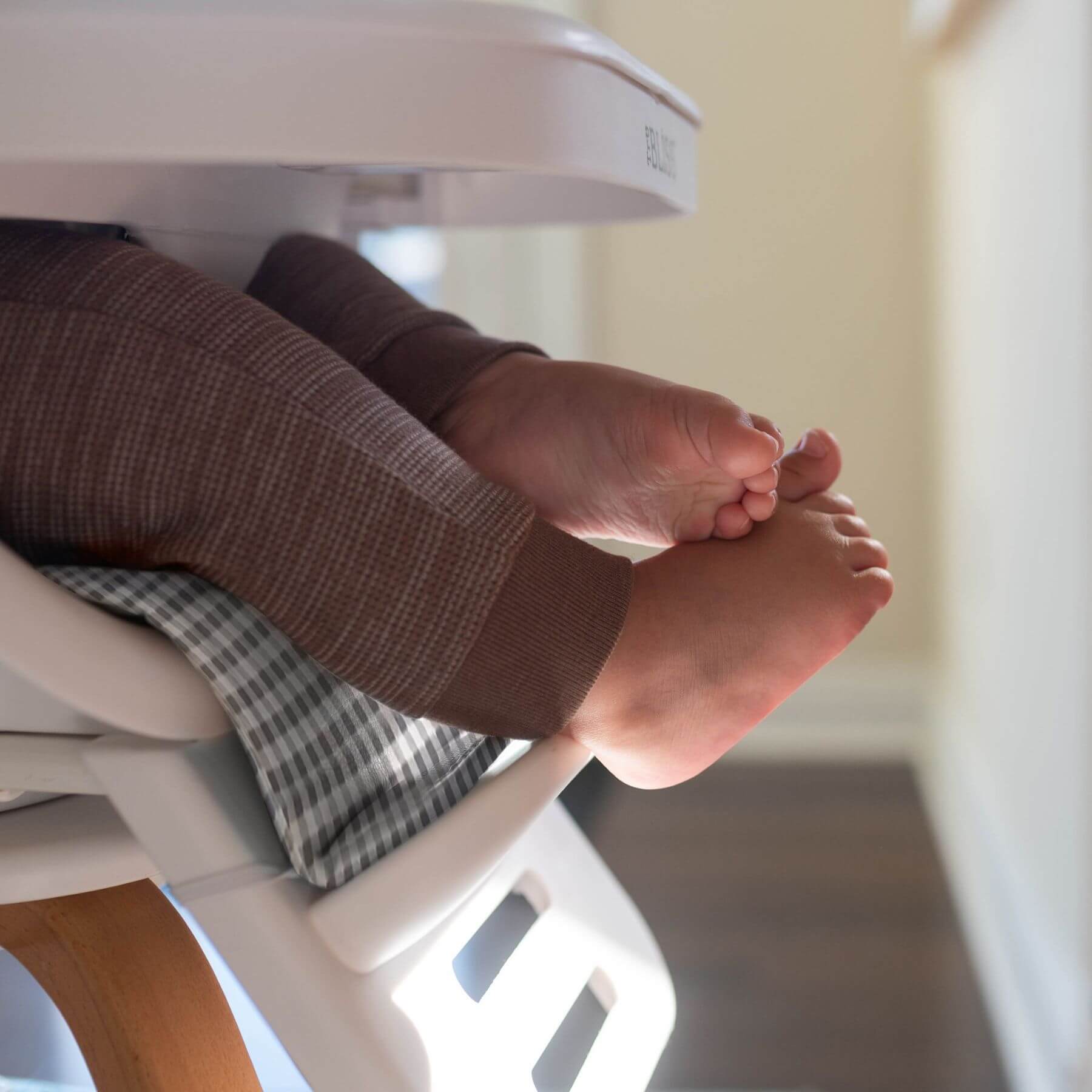 Detail of TruBliss 2-in-1 Turn-A-Tot Highchair with 360° Swivel Gingham