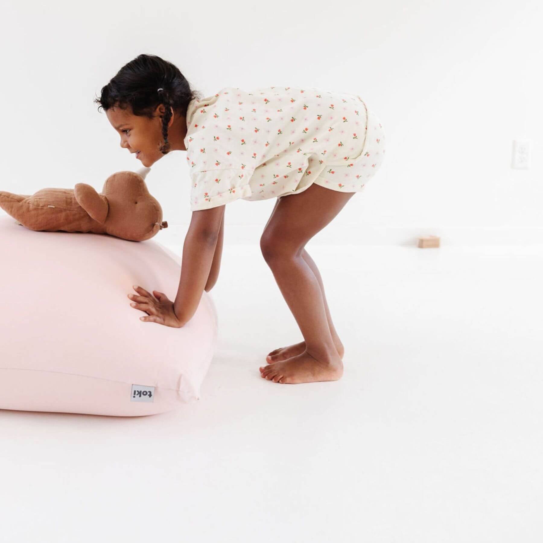 Child playing with Toki Kids Tutu Bean Bag