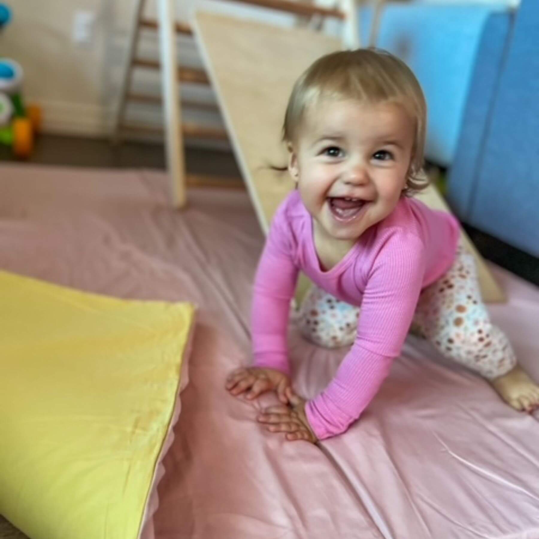 Baby playing on Toki Kids Tutu + Daisy Organic Cotton Mat