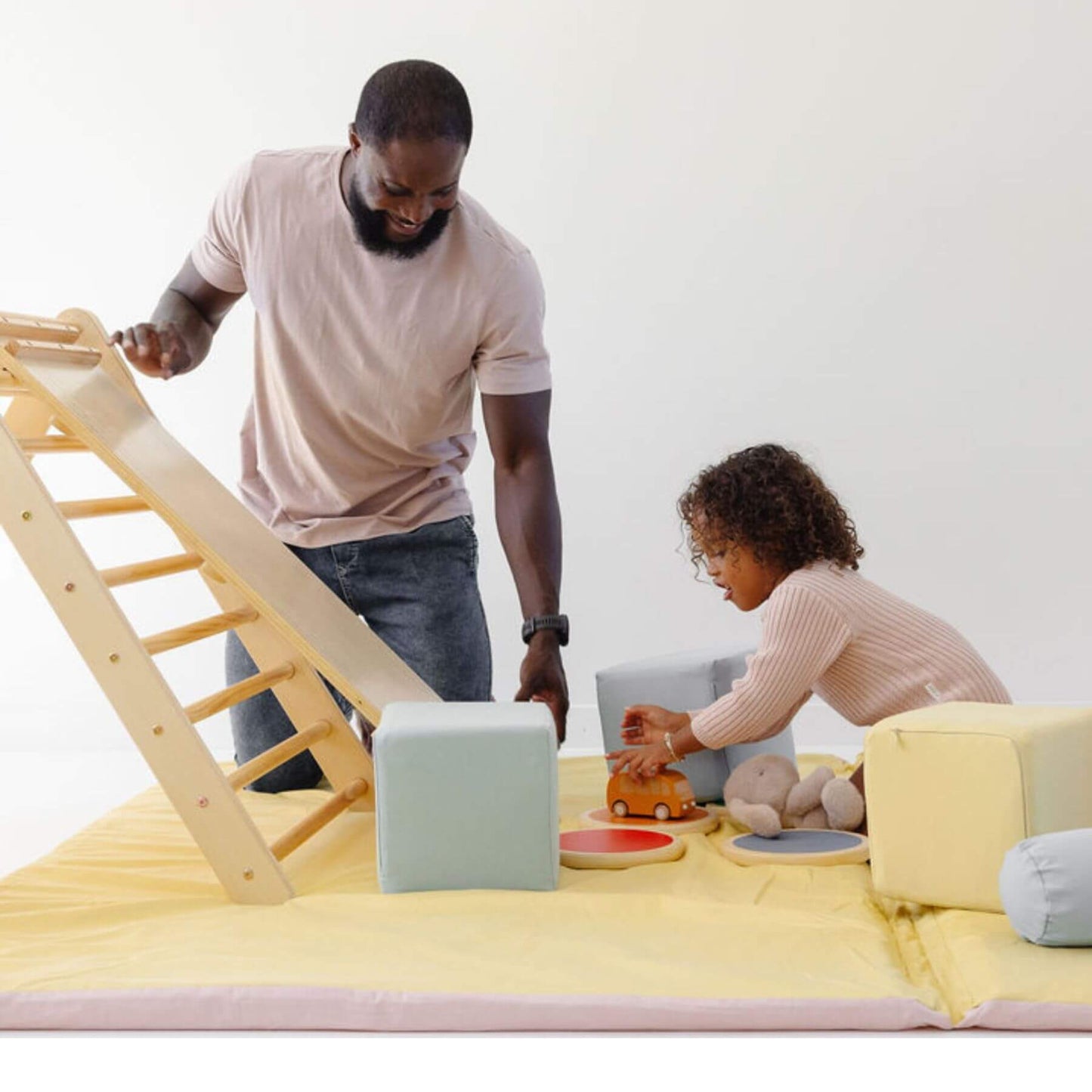 Man and kid playing on Toki Kids Tutu + Daisy Organic Cotton Mat