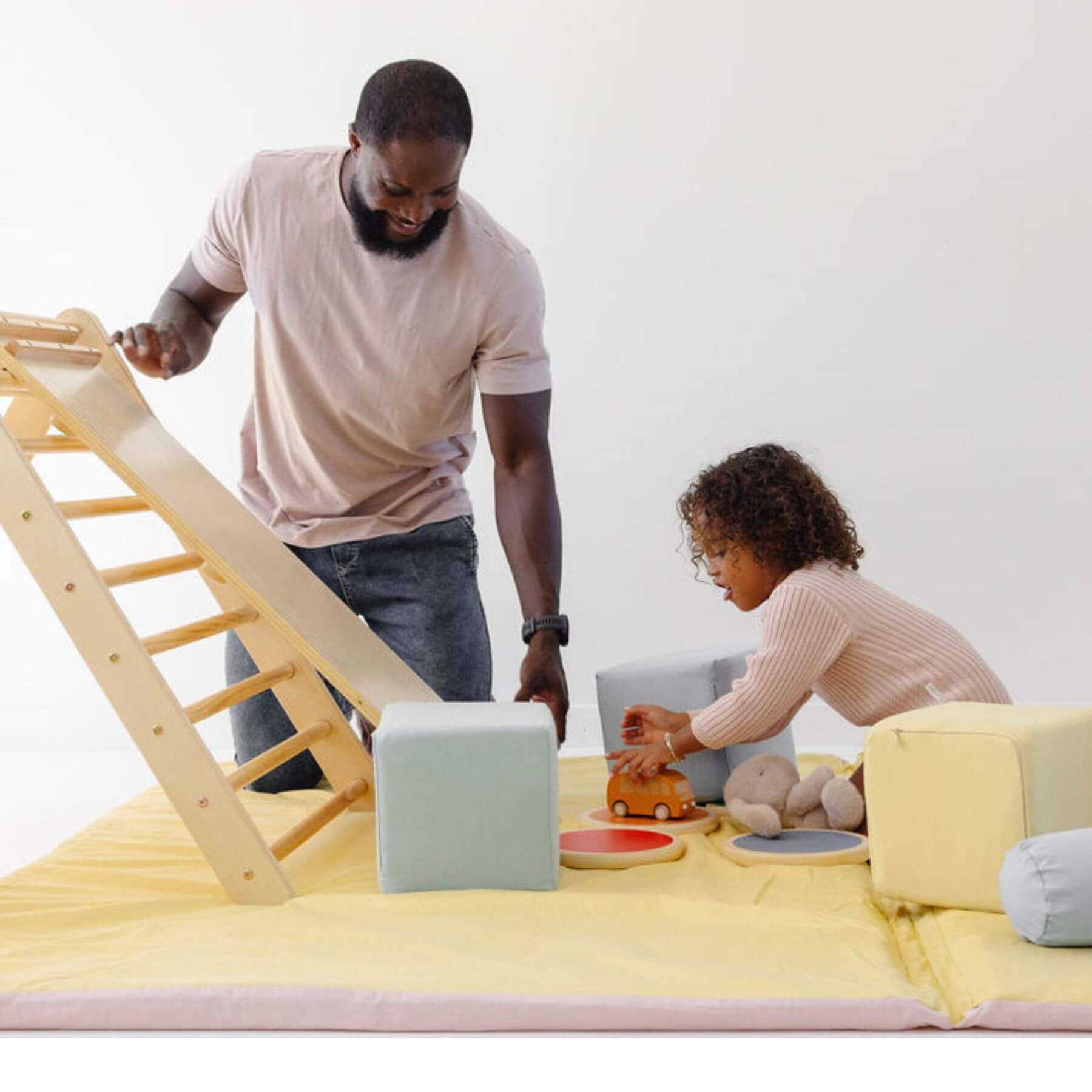 Man and kid playing on Toki Kids Tutu + Daisy Organic Cotton Mat